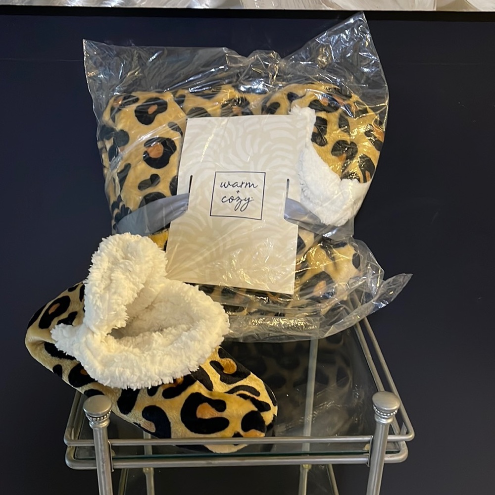 Warm and Cozy throw blanket with matching slippers, one size fits most.